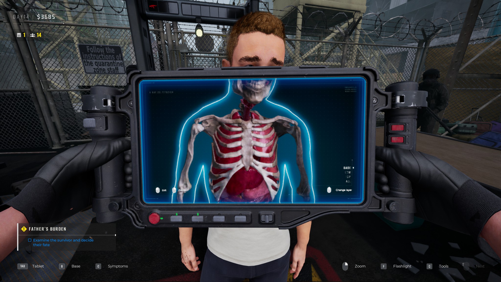 A hand-held x-ray scanning a survivor