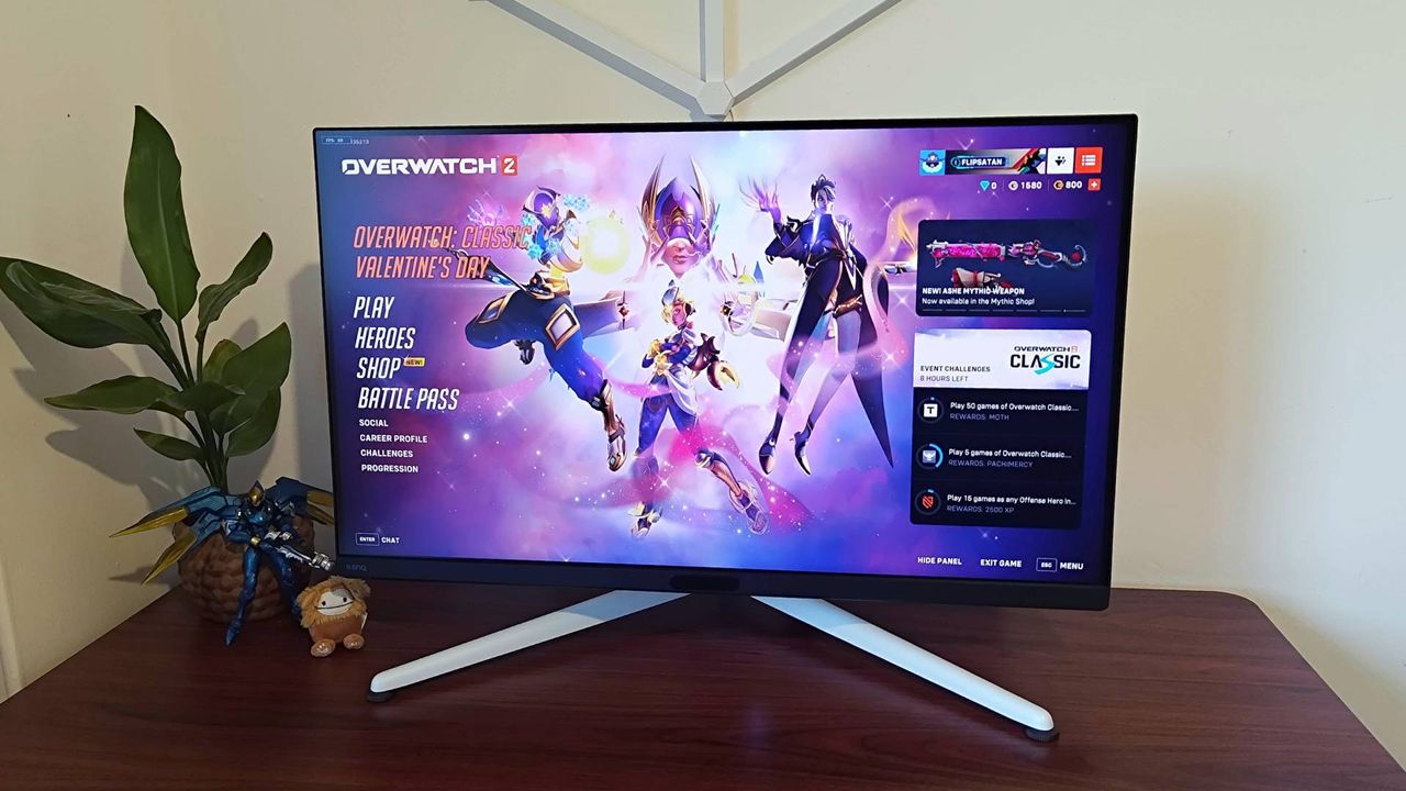 BenQ Mobiuz EX321UX gaming monitor with Overwatch 2 title screen displayed