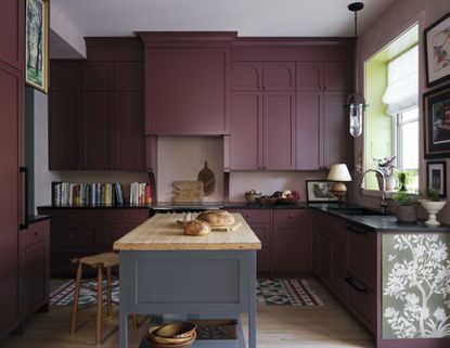 a red kitchen with a green accent window reveal