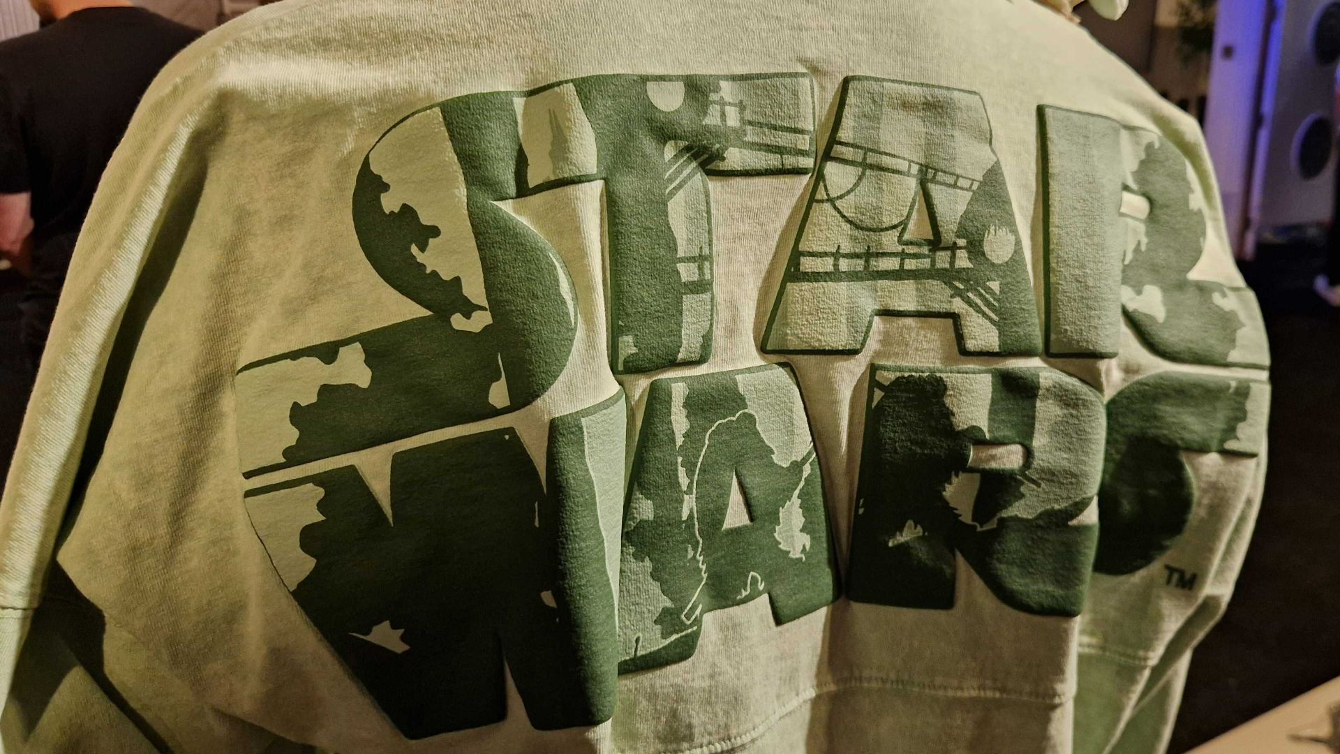 A green Spirit Jersey reading "Star Wars" with a forest design