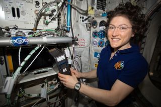 NASA astronaut Christina Koch services the BioFabrication Facility (BFF) at the International Space Station. The BFF is a 3D biological printer that manufactures organ-like tissues in microgravity.