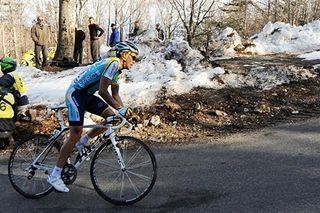 Alberto Contador (Astana) rides past snow at the 2009 Paris-Nice. The white stuff has forced ASO to shorten a stage of this year's edition of the race.