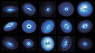 Fifteen blue glowing disks aligned in three rows with five disks each of varying sizes and tilts against a black background