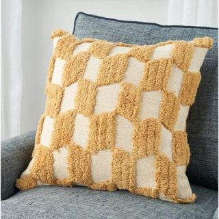 Yellow checkered pillow.