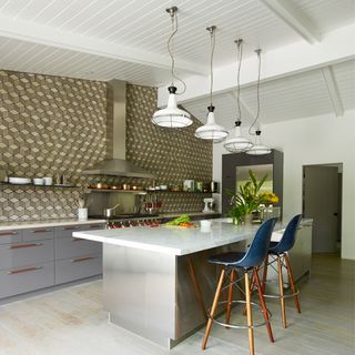 kitchen with geometric prints and marble counter