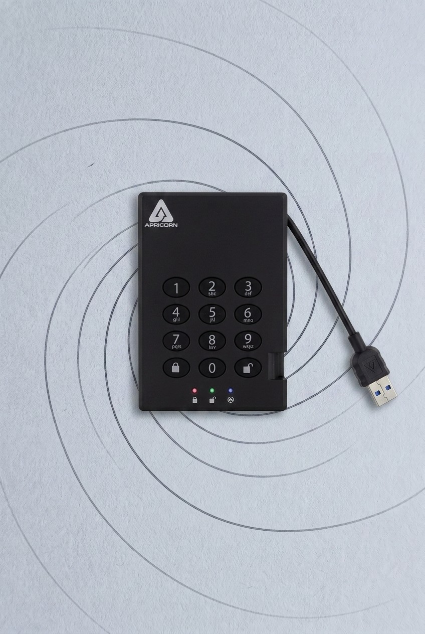 James Bond home office gear on a gunmetal background