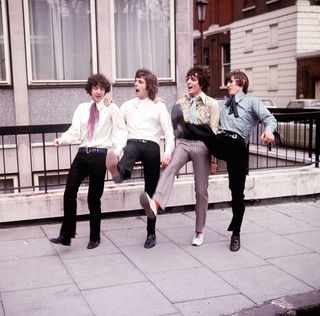 Pink Floyd pose on a London street