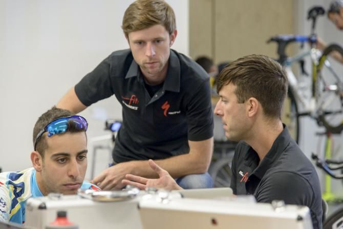 Checking over the data from the wind tunnel