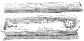 This reconstruction of coffin from an early Anglo-Saxon grave at Mucking Cemetery II in Essex shows what a dug-out wooden coffin would have looked like.