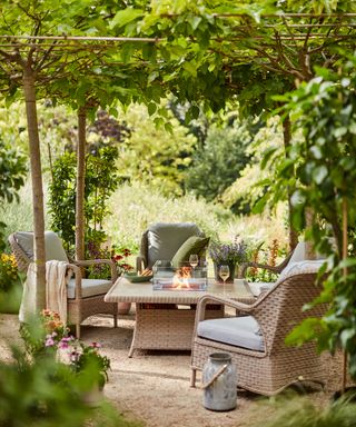 outdoor space with Dobbies furniture and tree canopy