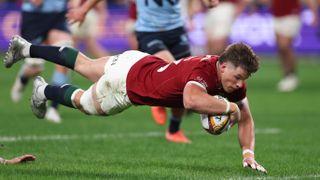 Huw Jones of the British & Irish Lions dives in to score their first try during the tour match between NSW Waratahs and British & Irish Lions at Allianz Stadium