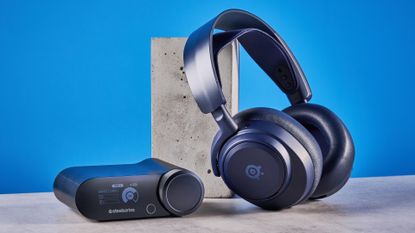 The SteelSeries Arctis Nova Pro Omni on a stone surface against a blue background