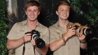 Robert Irwin poses alongside his wax figure during the unveiling of the Robert Irwin Wax Figure at Madame Tussauds Sydney on November 28, 2024 in Sydney, Australia. (Photo by Don Arnold/WireImage)