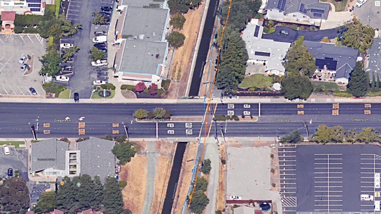 A Google Maps top-down view showing GPS lines for the Garmin Forerunner 970 (orange) and COROS PACE Pro (blue) indicating a running path.