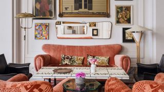 Colorful, eclectic interiors at a hotel merge vintage and contemporary design through plush surfaces, bright hues, and playfulness.