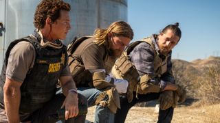 (L to R) Shawn Hatosy as Pope, Ben Robson as Craig and Jake Weary as Deron, kneeling, in an image from Animal Kingdom