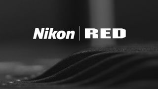 Nikon and Red logos against a dark moody background
