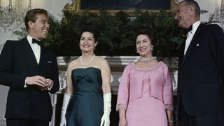 President Lyndon Johnson (R), Princess Margaret, Mrs. Johnson, and Lord Snowdon pose for photographers in the Queen's room at the White House November 17th, prior to a dinner-dance in honor of the Princess and Lord Snowdon.
