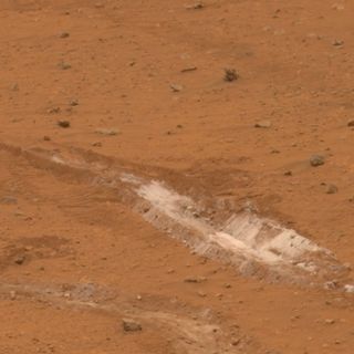 A 20cm track revealing white silica and a clue that Mars was once wet and warm.