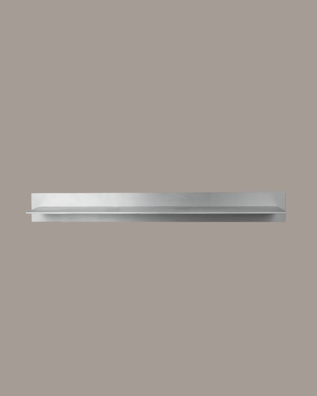 Single Large Lager Wall Shelf in Aluminium against brown background.