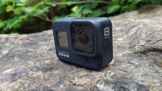 The GoPro Hero8 Black camera on a rock