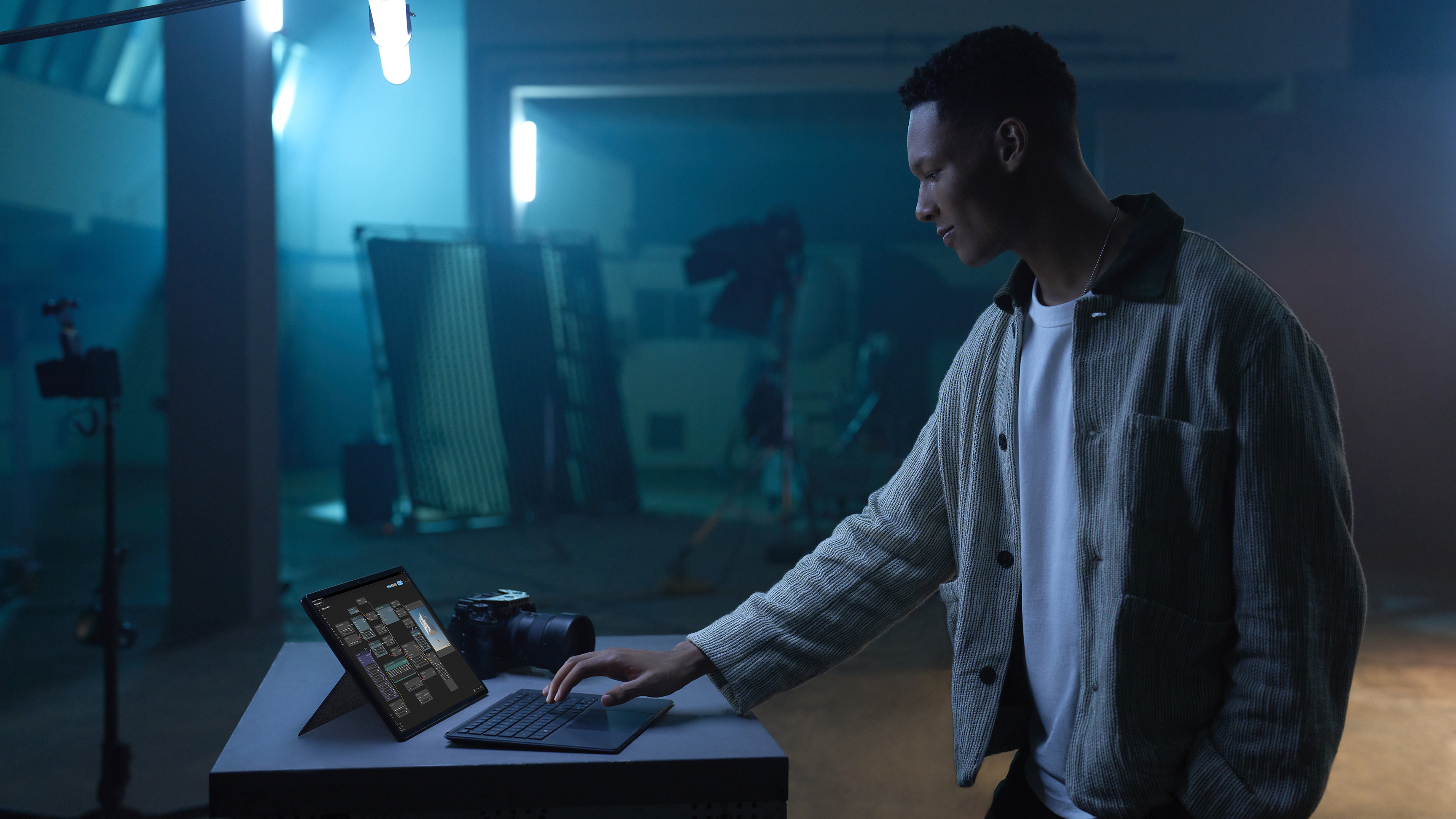 A man uses the Asus ProArt PZ14 laptop