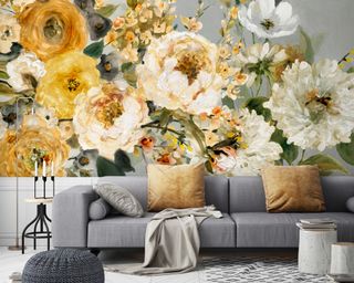 Large scale floral wall mural featuring blowsy blooms in riotous shades of warm yellow.