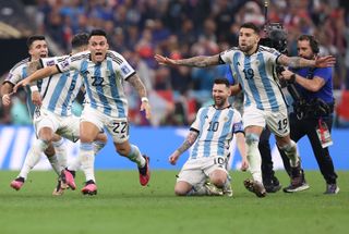 Argentina players celebrate victory on penalties against France in the 2022 World Cup final.