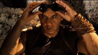 Riddick screengrab, showing Vin Diesel wearing goggles