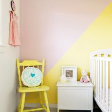 kids room with yellow chair and white vanity