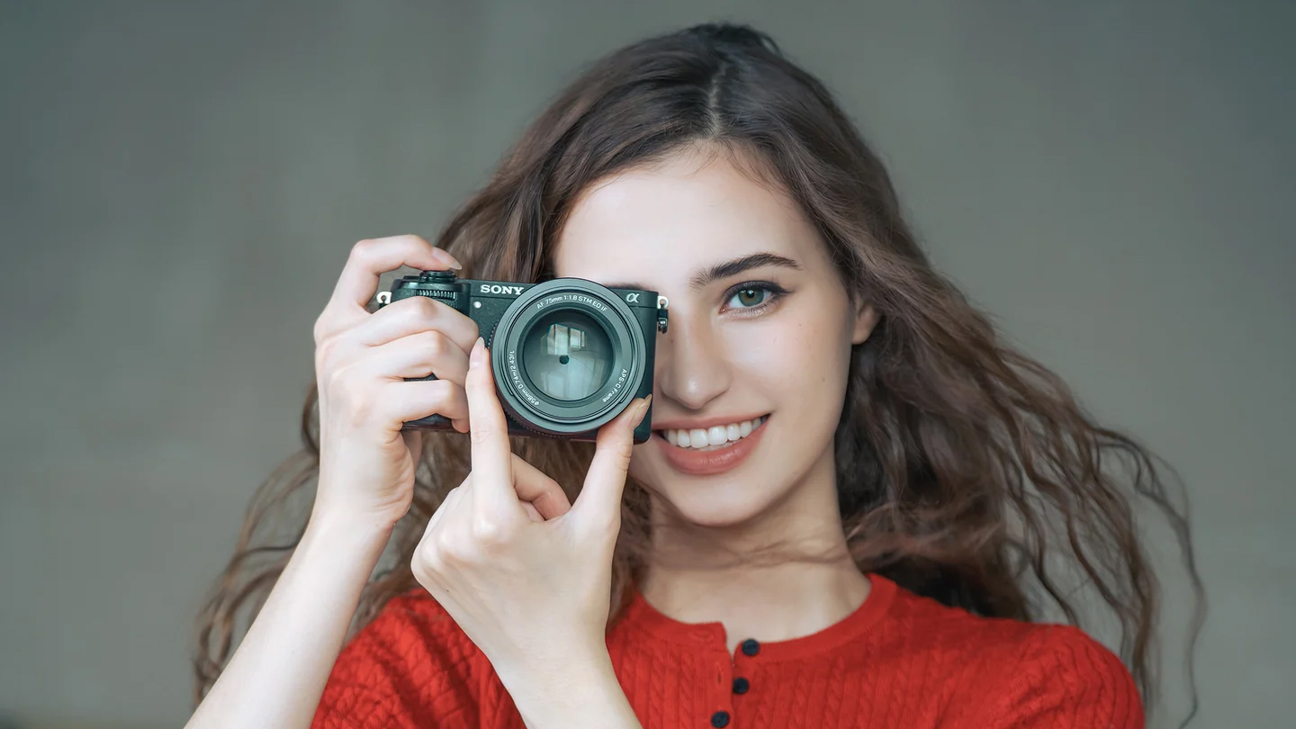 The VIltrox AF 75mm f/1.8 Evo being used by a photographer