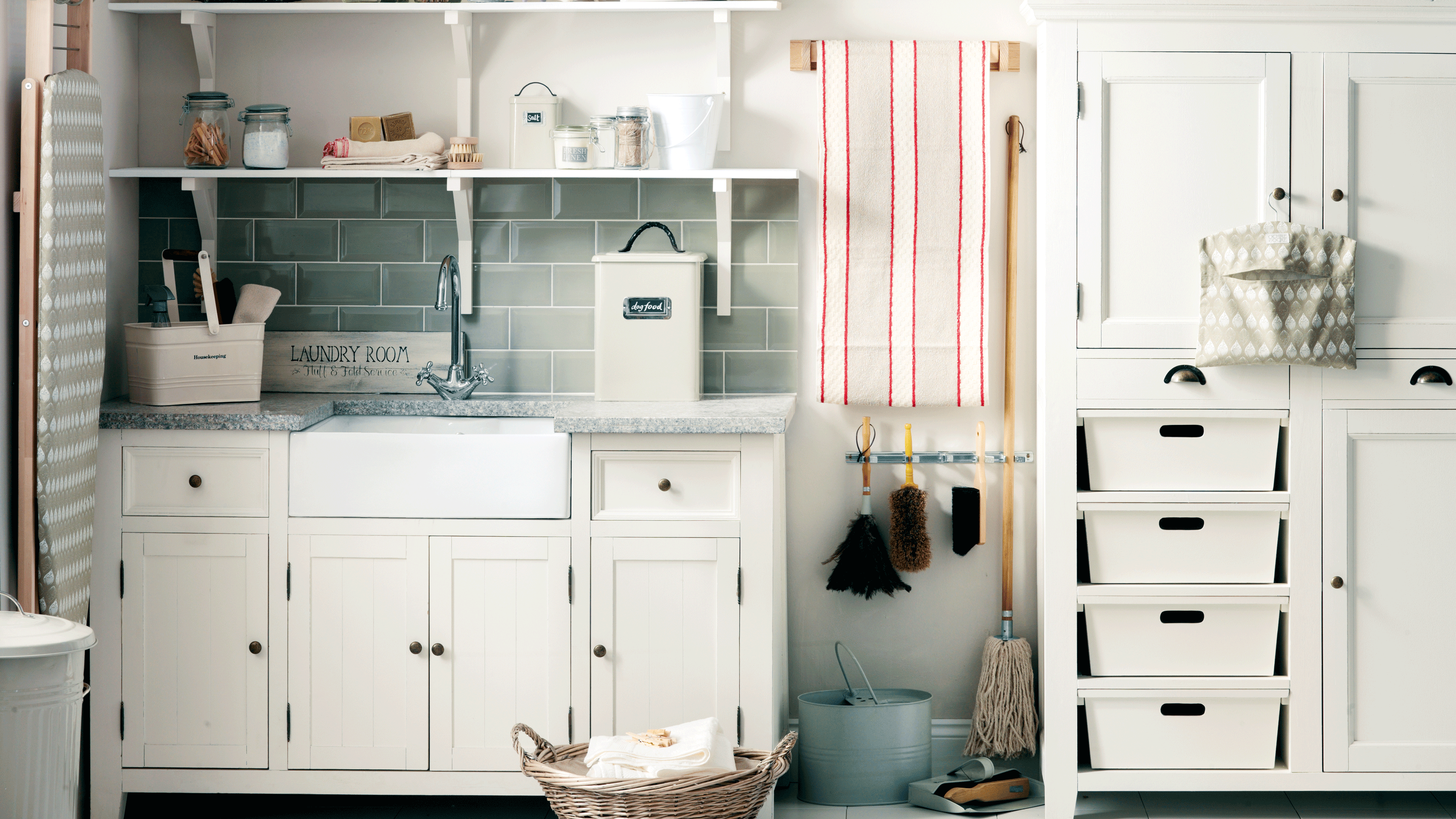 Cream utility room with cleaning supplies