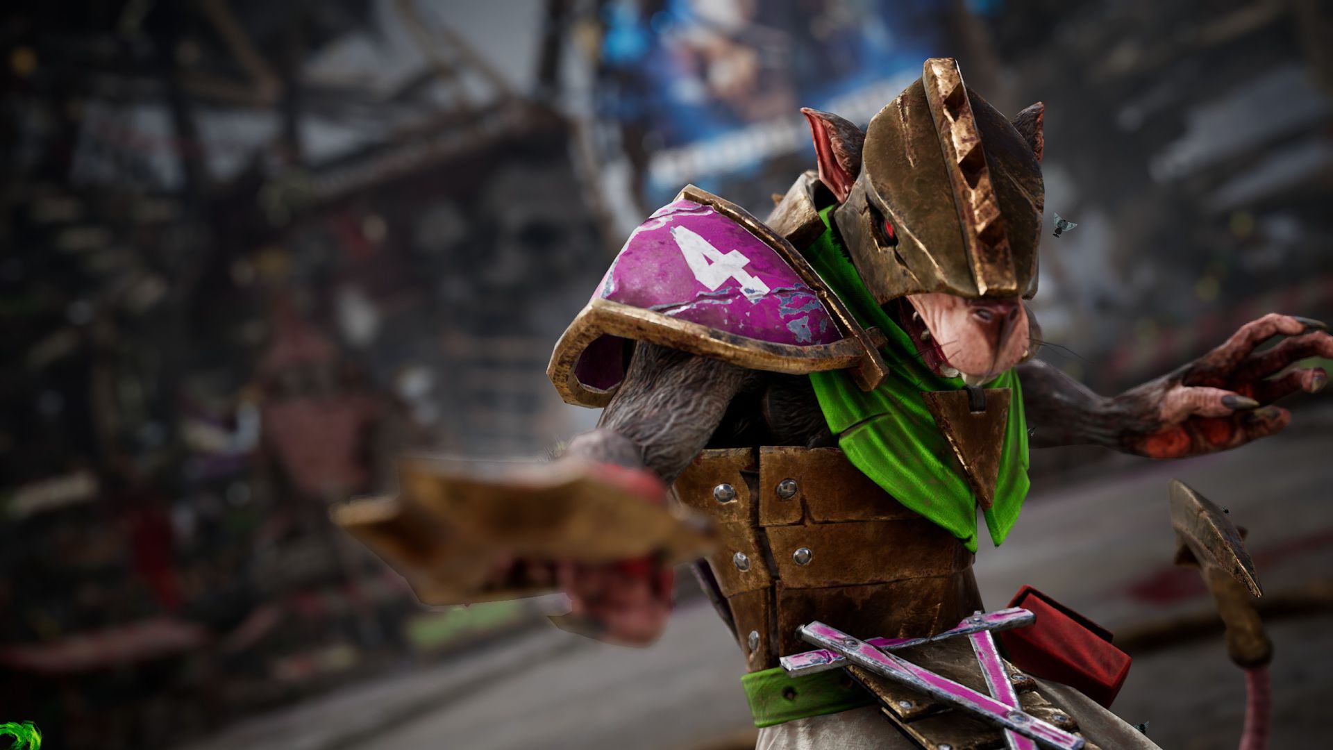 A skaven player points spiked brass knuckles at the camera