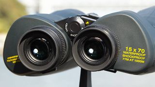 Angled view of the eyepieces on a pair of 15x70 shockproof binoculars.