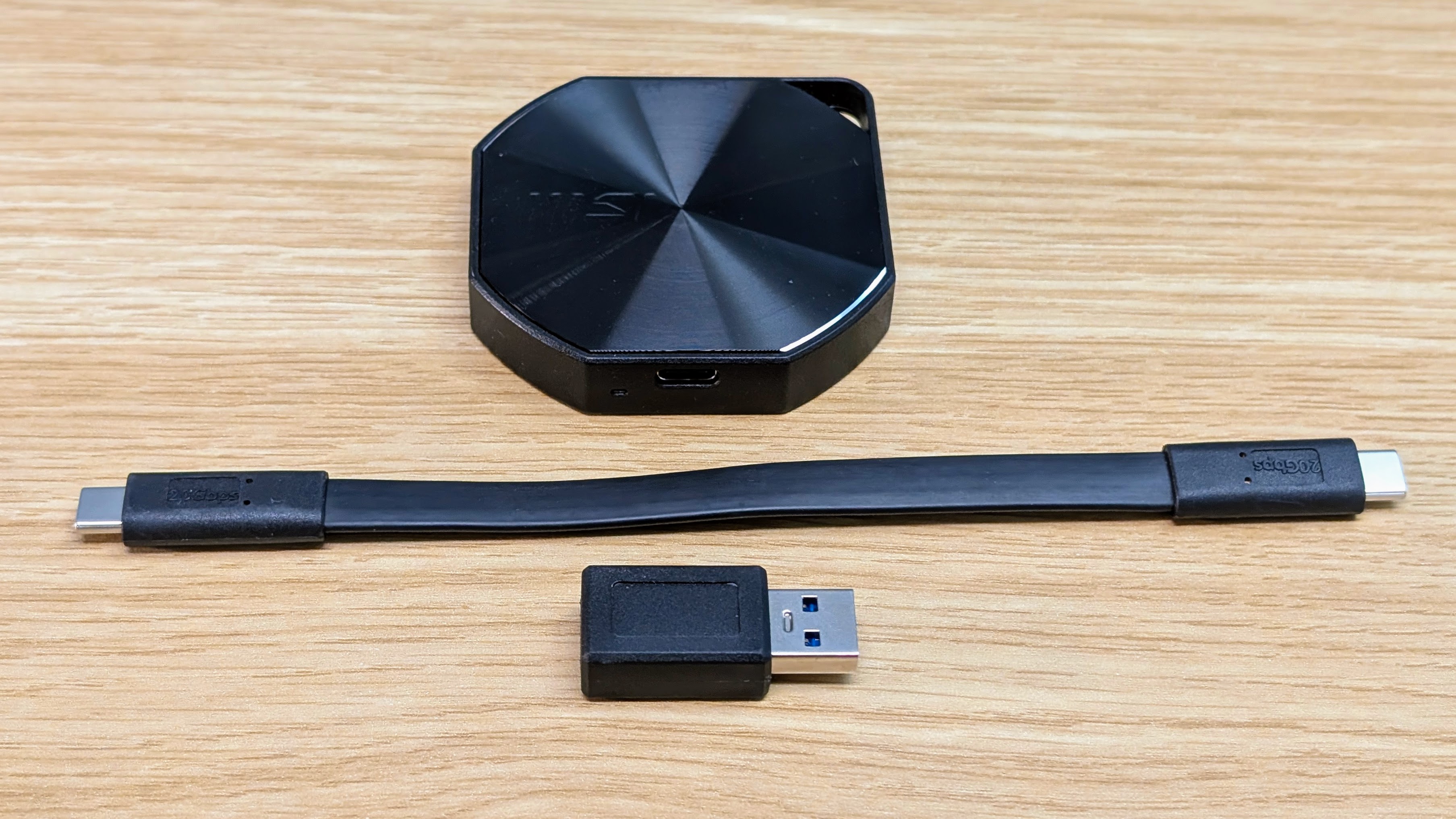 MSI Datamag portable SSD with USB-C cable and USB-C to USB-A adapter