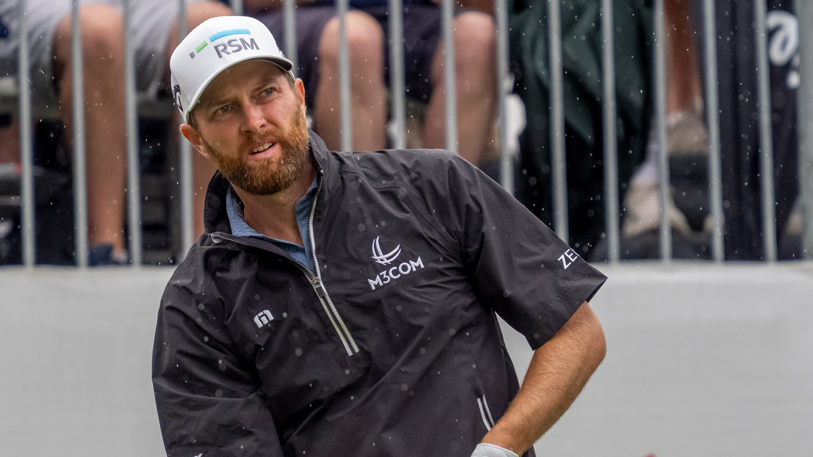 Chris Kirk watches a tee shot