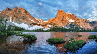 A lake in Rocky Mountain National park at sunset