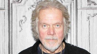 Randy Bachman posing for a photograph in 2015