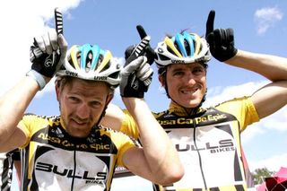 Karl Platt and Stefan Sahm of team Bulls 1 celebrate winning The 2010 Absa Cape Epic during the final stage (stage eight) of the 2010 Absa Cape Epic Mountain Bike stage race held in and around Oak Valley in the Western Cape, South Africa.