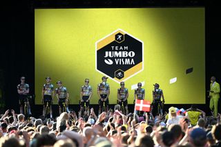 COPENHAGEN DENMARK JUNE 29 Tiesj Benoot of Belgium Steven Kruijswijk of Netherlands Sepp Kuss of United States Christophe Laporte of France Primoz Roglic of Slovenia Wout Van Aert of Belgium Nathan Van Hooydonck of Belgium Jonas Vingegaard Rasmussen of Denmark and Team Jumbo Visma during the Team Presentation of the 109th Tour de France 2022 at Tivoli Gardens in Copenhagen City TDF2022 on June 29 2022 in Copenhagen Denmark Photo by Stuart FranklinGetty Images