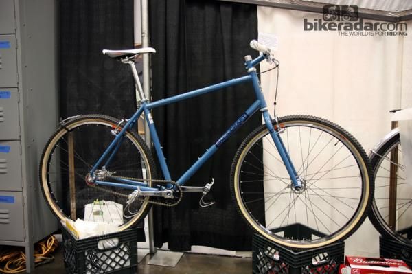 Soulcraft's new Dirtbomb is designed for medium-sized 700c tires to yield a versatile runabout that's more capable than a road bike but not as cumbersome as a full-blown 29er. Geometry is closer to that of a 'cross bike and options include everything from singlespeed and geared builds, flat or drop bars, touring configurations, and disc or linear-pull brakes.