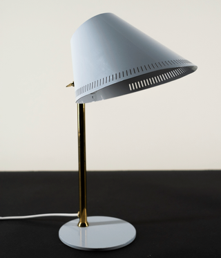 Table light with light blue shade and base