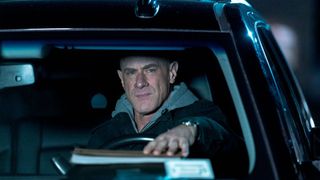 Christopher Meloni inside a car in Law & Order: Organized Crime season 3