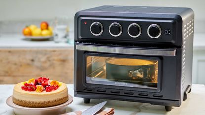 Cheesecake being cooked in air fryer oven