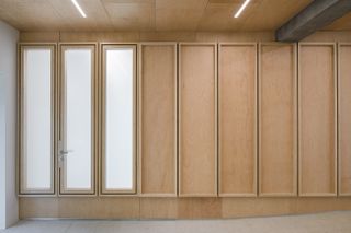 Murado & Elvira designed Baiona Library maple wood details