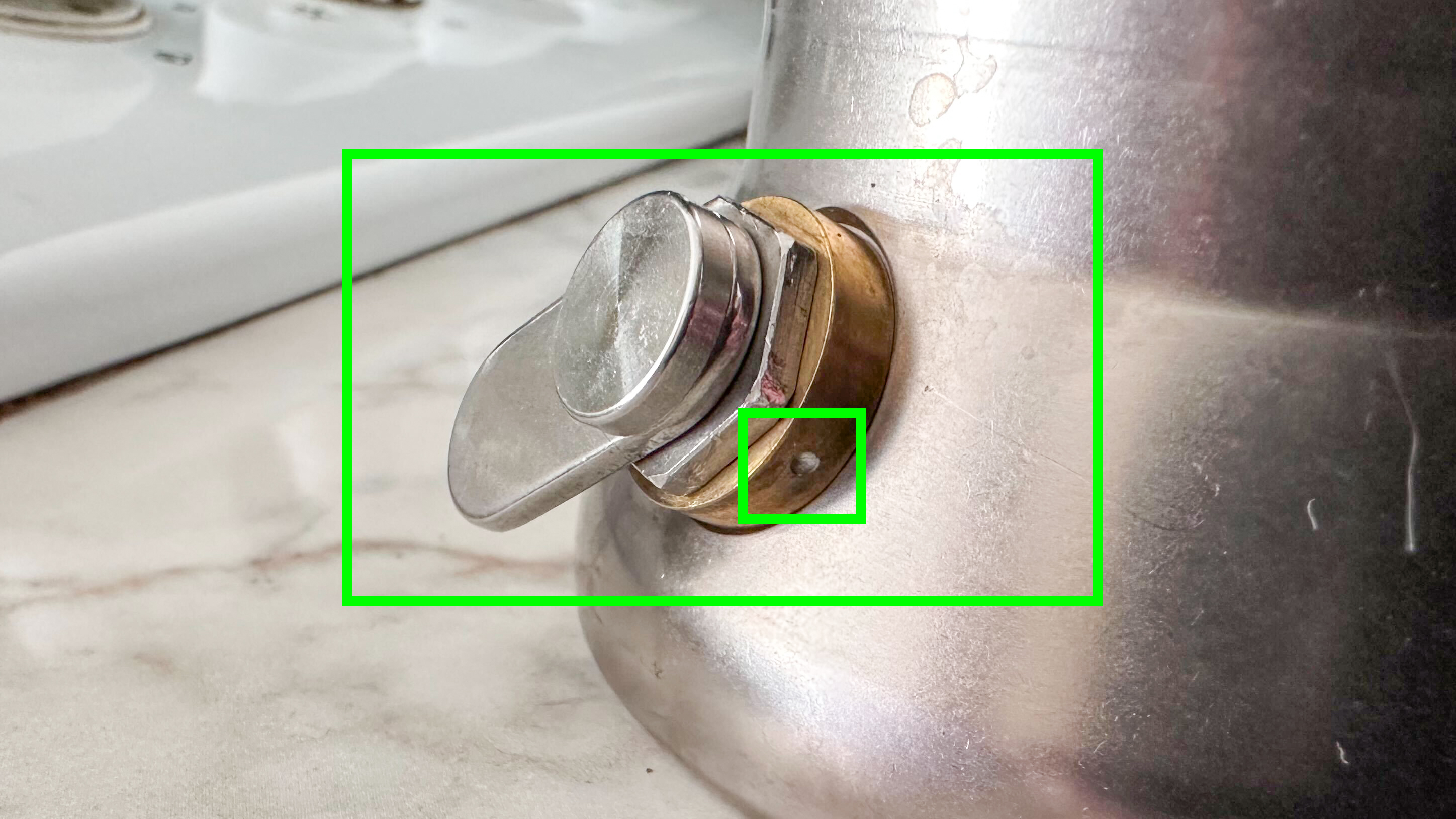 A photo showing the 9Barista Espresso Machine Mk.2 pressure release valve