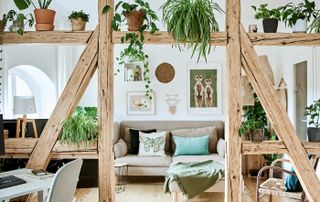 a living room with wood beams as a room divider idea