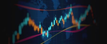 closeup of financial chart with teal and orange bars