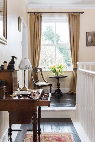 Landing in Georgian farmhouse with sewing table