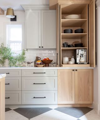 Modern kitchen with Scandi influences and open pantry cupboard